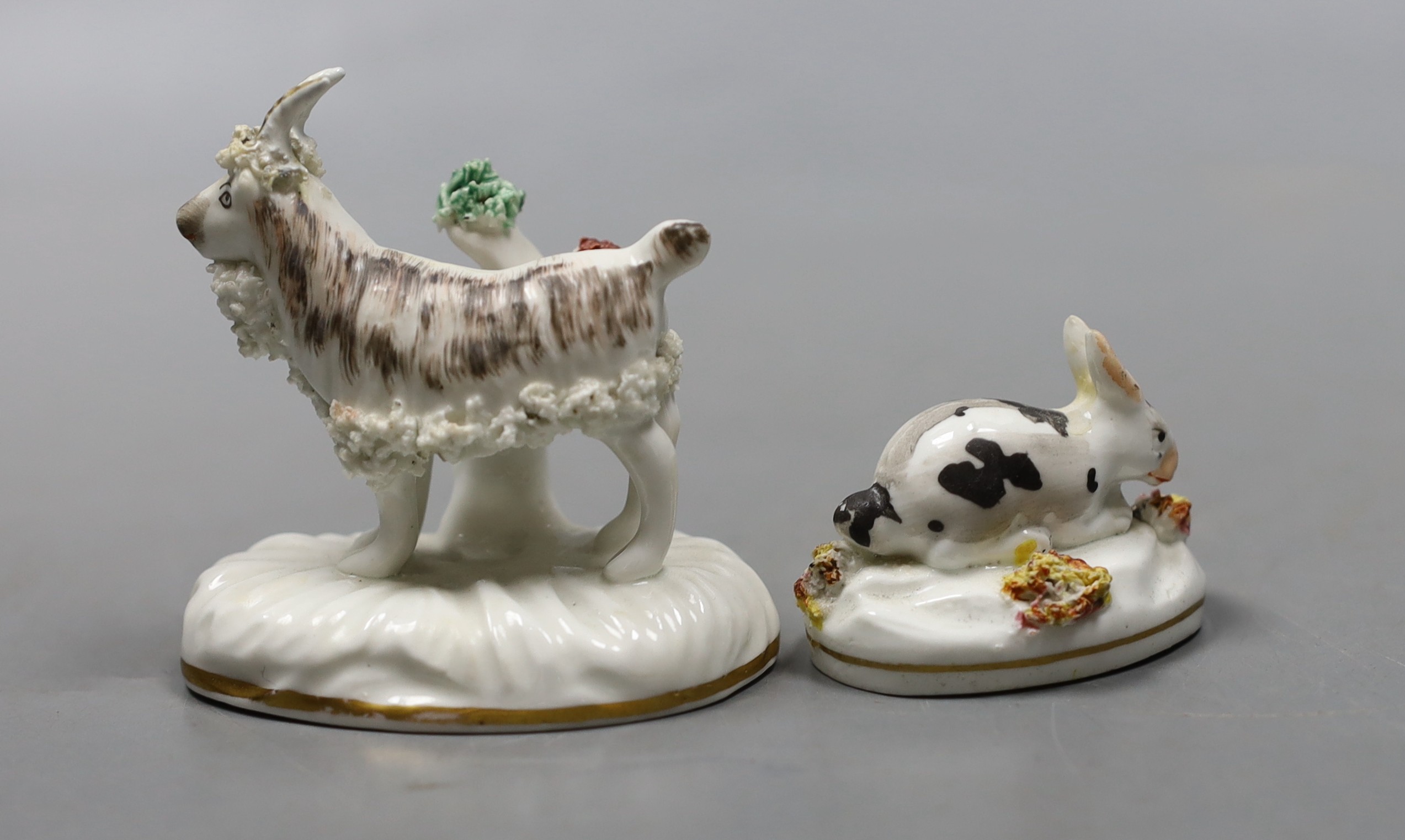 A Staffordshire porcelain model of a Billy goat, 7 cm long and a similar model of a recumbent rabbit, c.1830–50 (2), Provenance- Dennis G Rice collection